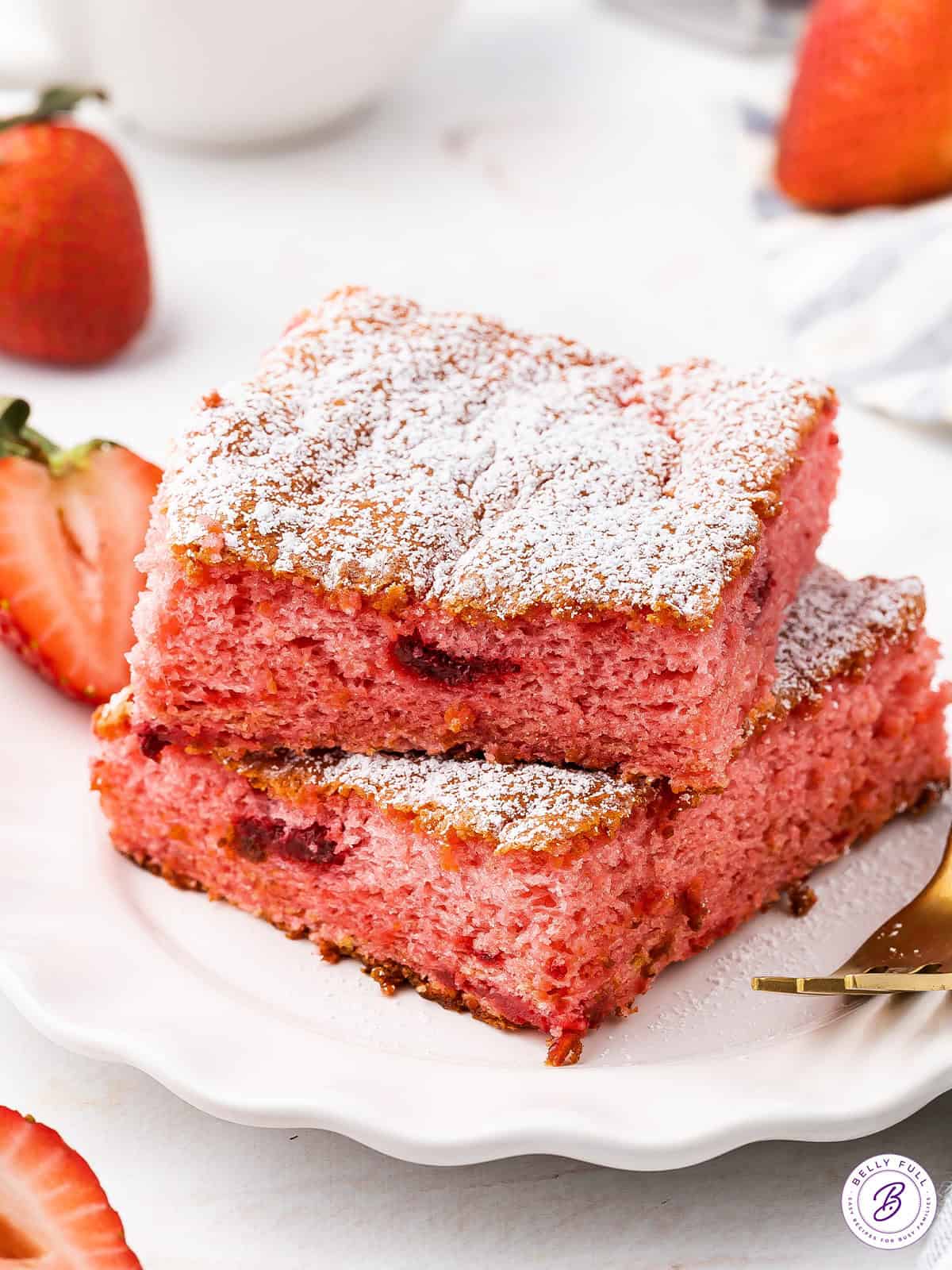 2 stacked slices of strawberry cake