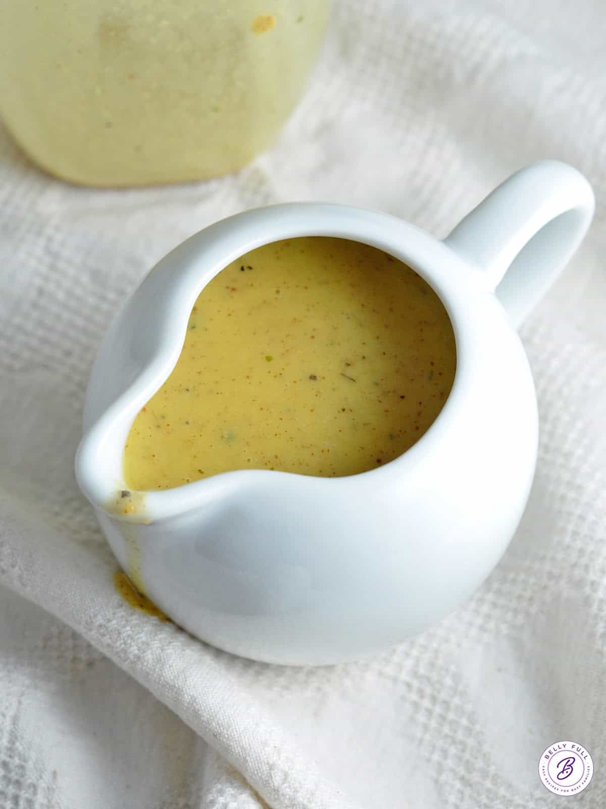 Honey Mustard Vinaigrette in white gravy boat