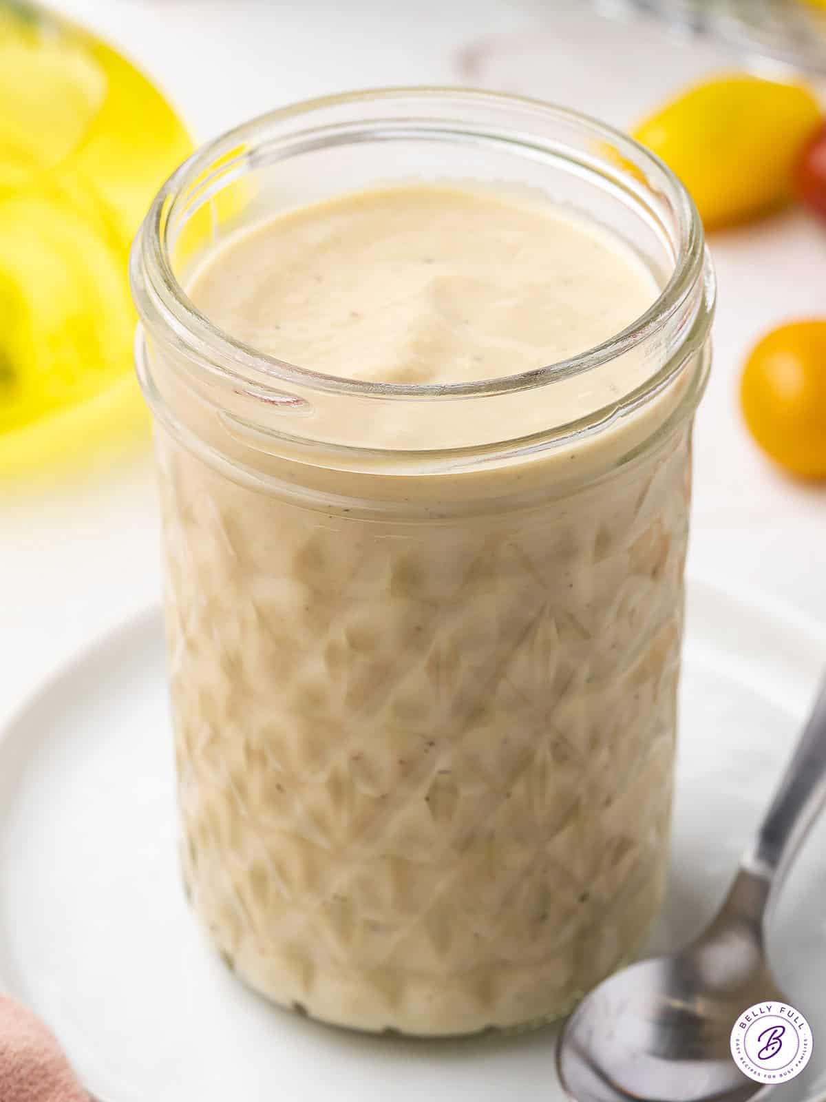 A jar of tahini dressing