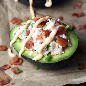 tuna stuffed avocado with crisp bacon