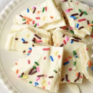 overhead broken pieces of chocolate cookie bark on plate
