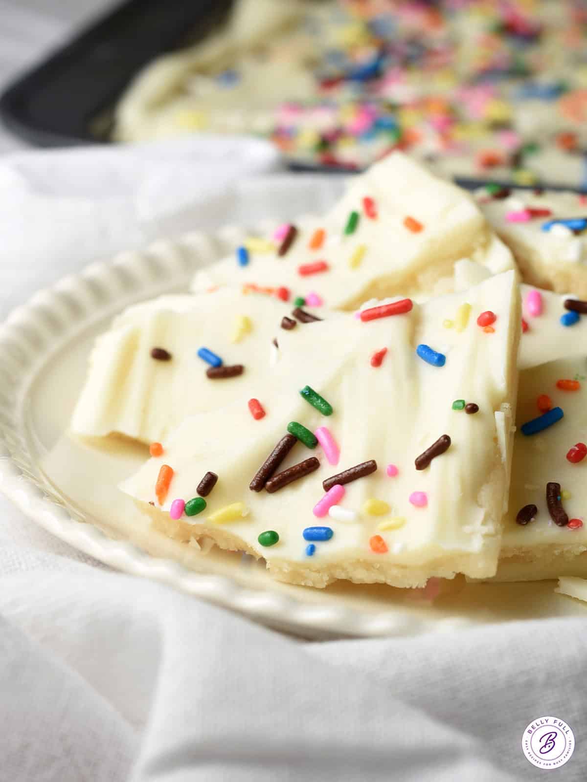 pieces of sugar cookie bark on plate