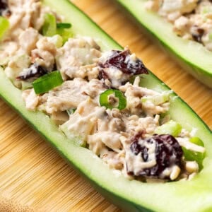 Close up of a cucumber boat with chicken salad