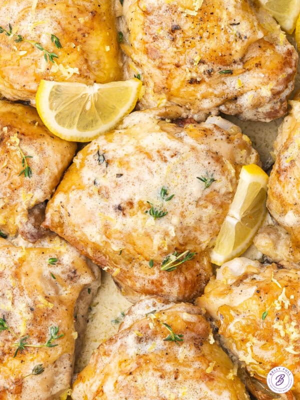 overhead close up chicken thigh with skin in lemon cream sauce