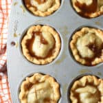 overhead mini peach pies baked in mini muffin tin