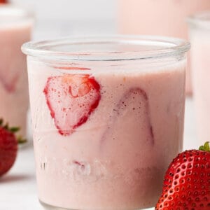 A glass of strawberries and cream agua fresca