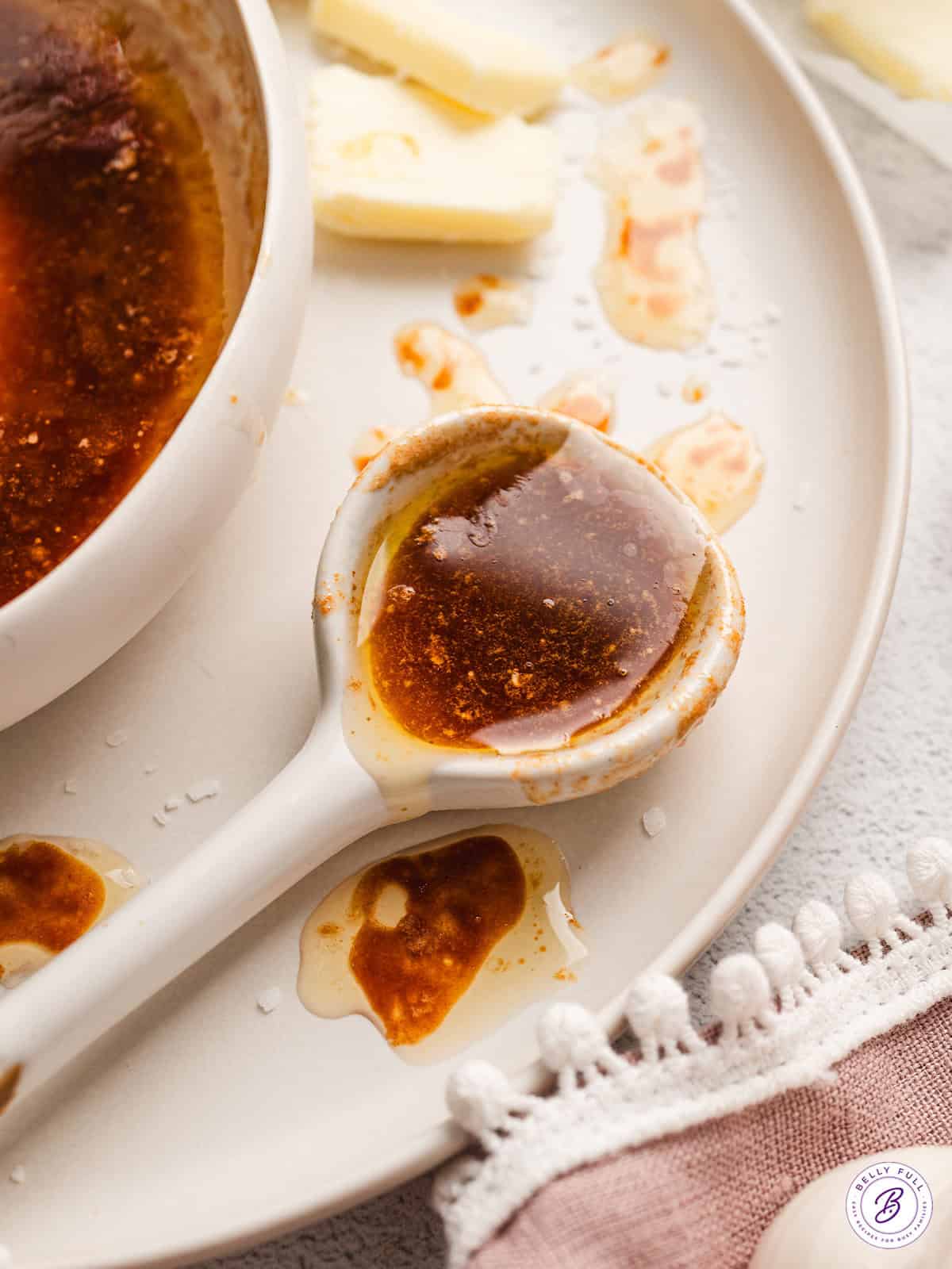 A spoon of brown butter soy sauce