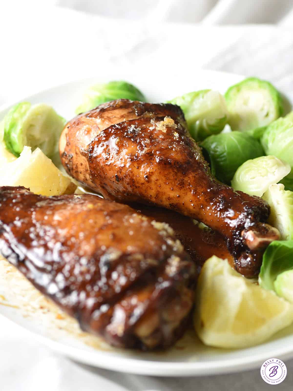 pan fried chicken leg with glaze on plate