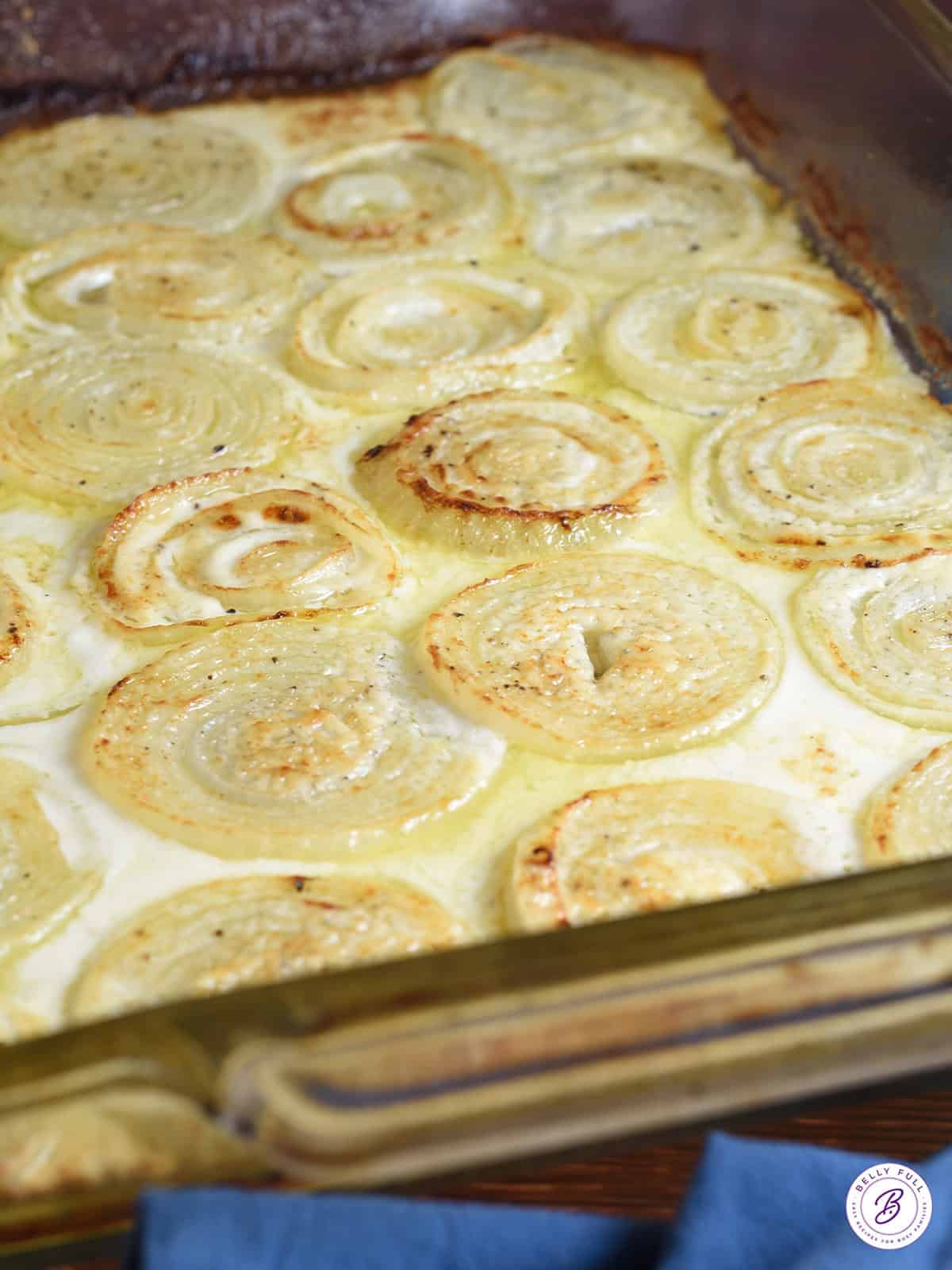 creamy roasted onions in casserole dish