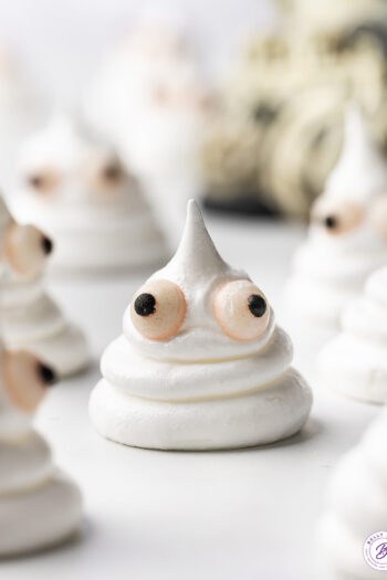 close up Halloween Ghost Meringue Cookie with candy eyes