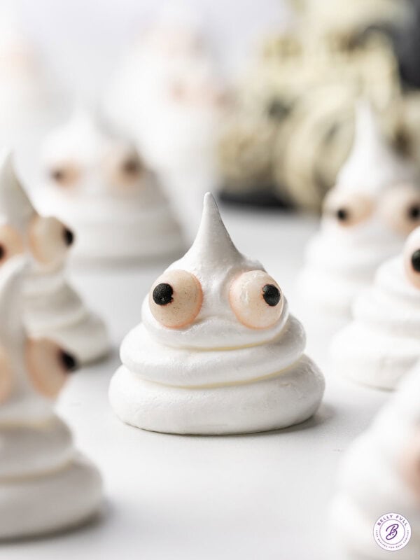close up Halloween Ghost Meringue Cookie with candy eyes