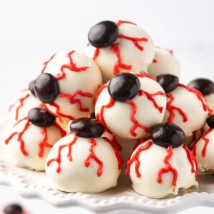 Pile of Halloween bloodshot eyes chocolate candy on serving tray