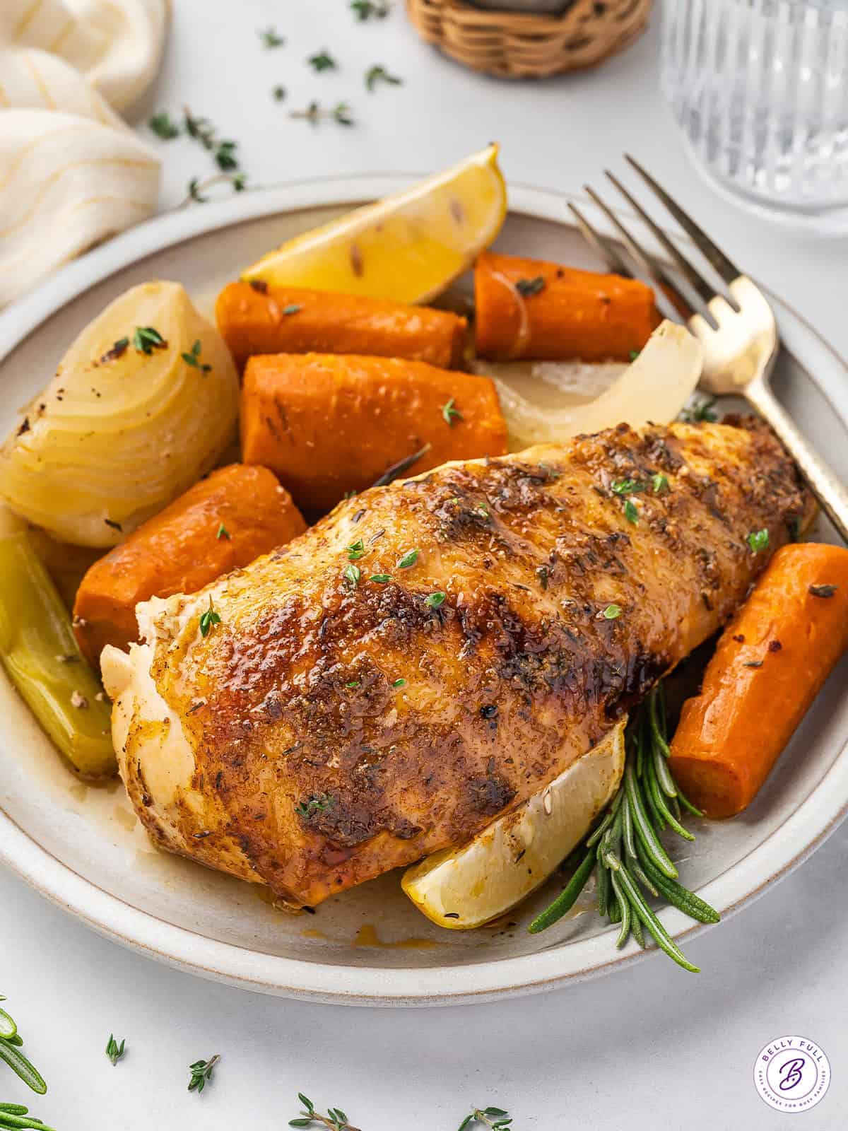 cooked chicken breast with skin on plate with vegetables