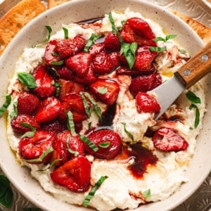 A bowl of whipped feta with balsamic strawberries