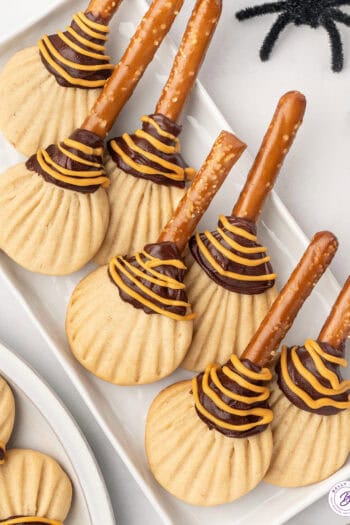 witch broom cookies on serving tray