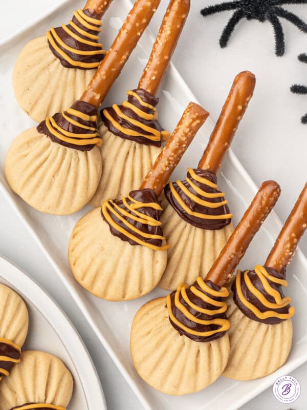 witch broom cookies on serving tray