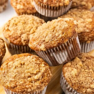 Overhead view of a pile of banana crumb muffins