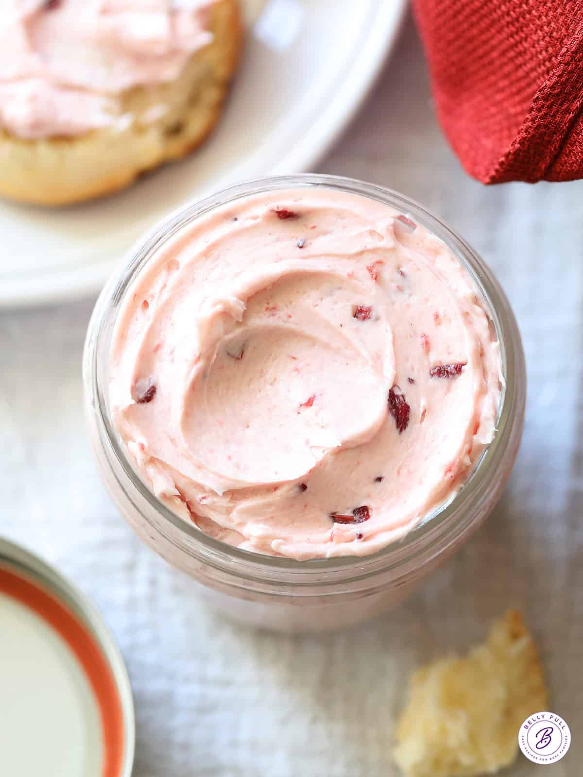 overhead cranberry butter swirled in glass jar