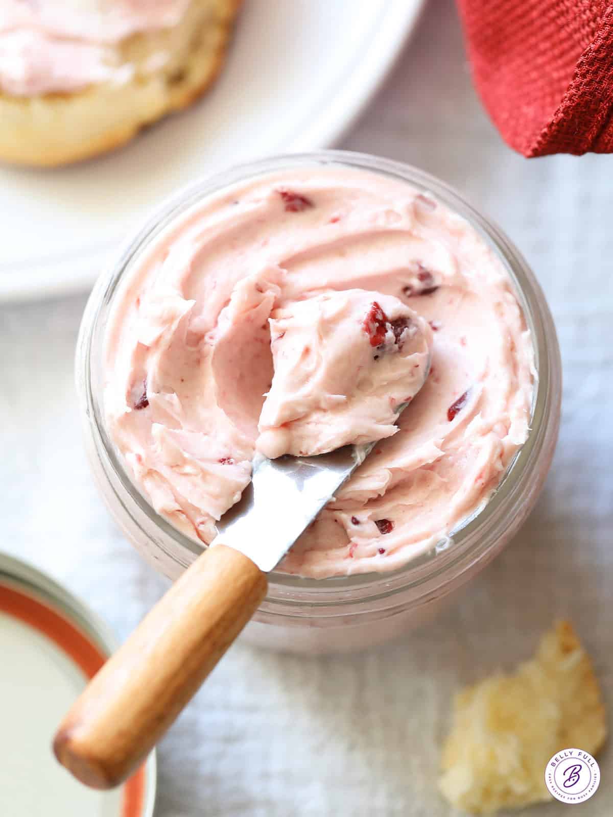 tiny knife with scoop of cranberry butter