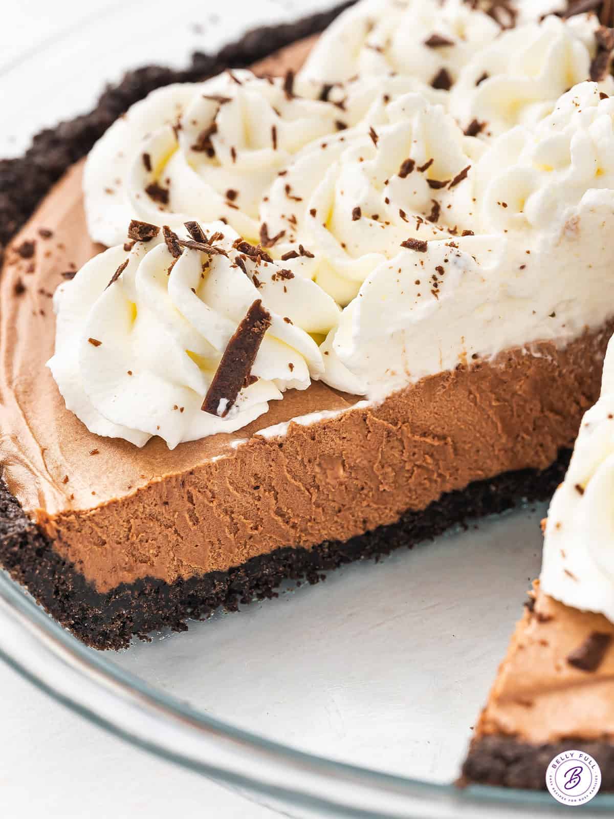 Side view of french silk pie with a slice missing.