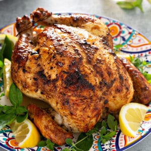 whole roast chicken on serving platter
