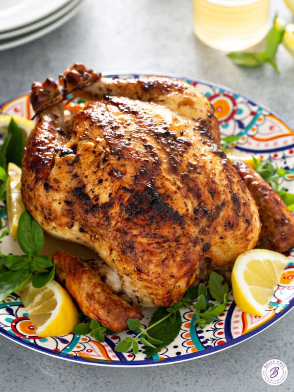 whole roast chicken on serving platter