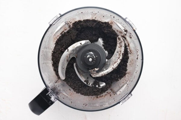 Crushed oreos in a food processor.