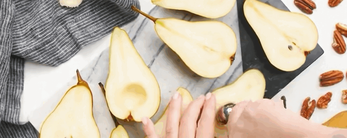Cutting pears and removing the seeds. 