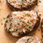 Overhead view of beef tenderloin with pepper cream sauce