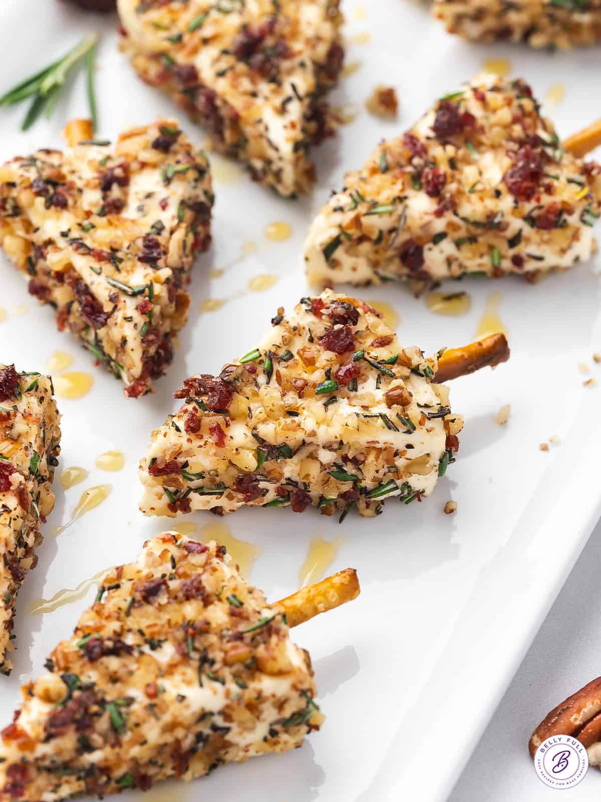 Close up of Christmas cheese trees on a white platter