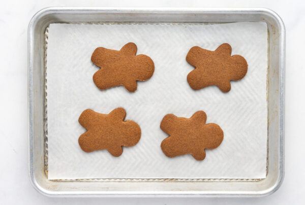 baked Gingerbread man cookies on a baking sheet