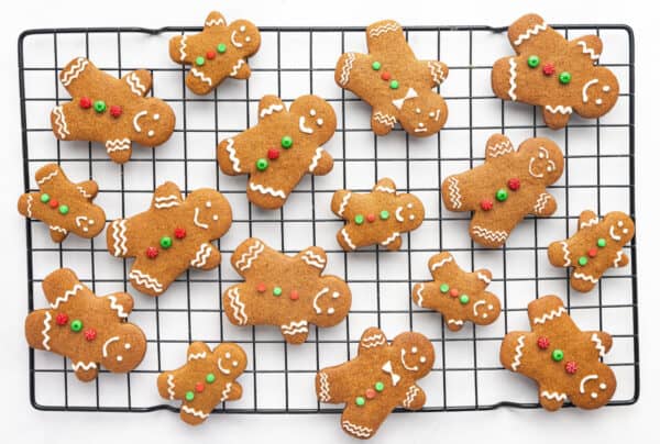 decorated Gingerbread men cookies on wire rack