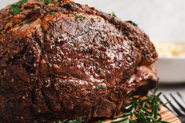 A side view close up of a roasted prime rib roast.