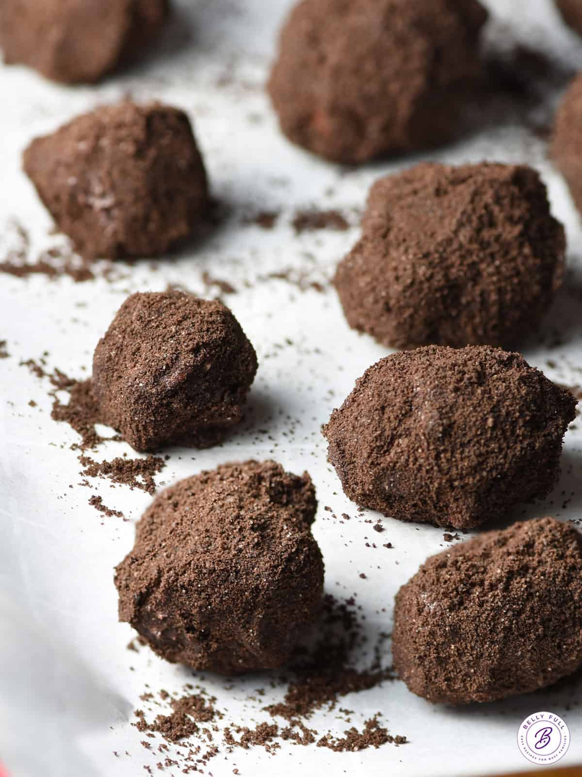 Lumps of Coal Rice Krispie Treats on parchment paper