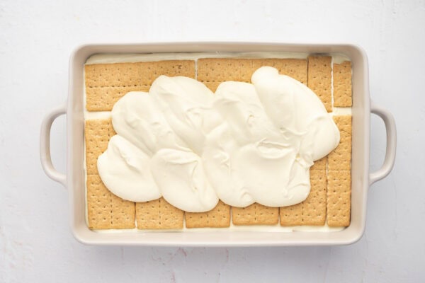 second layer of pudding spread over graham cracker sheets in casserole dish