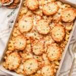 Overhead view of French onion mac and cheese in a baking dish.