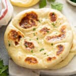 warm homemade naan with garlic, butter, and parsley