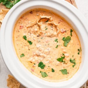 Overhead view of rotel and sausage cheese dip in a crockpot