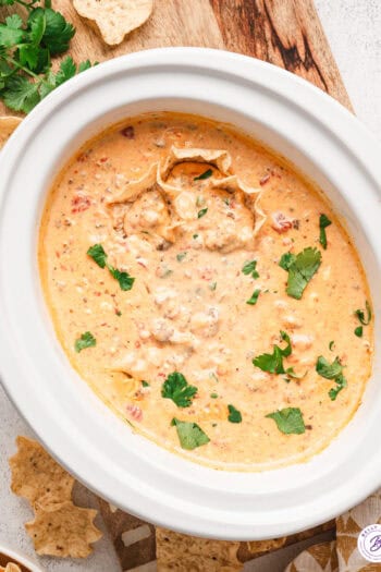 Overhead view of rotel and sausage cheese dip in a crockpot