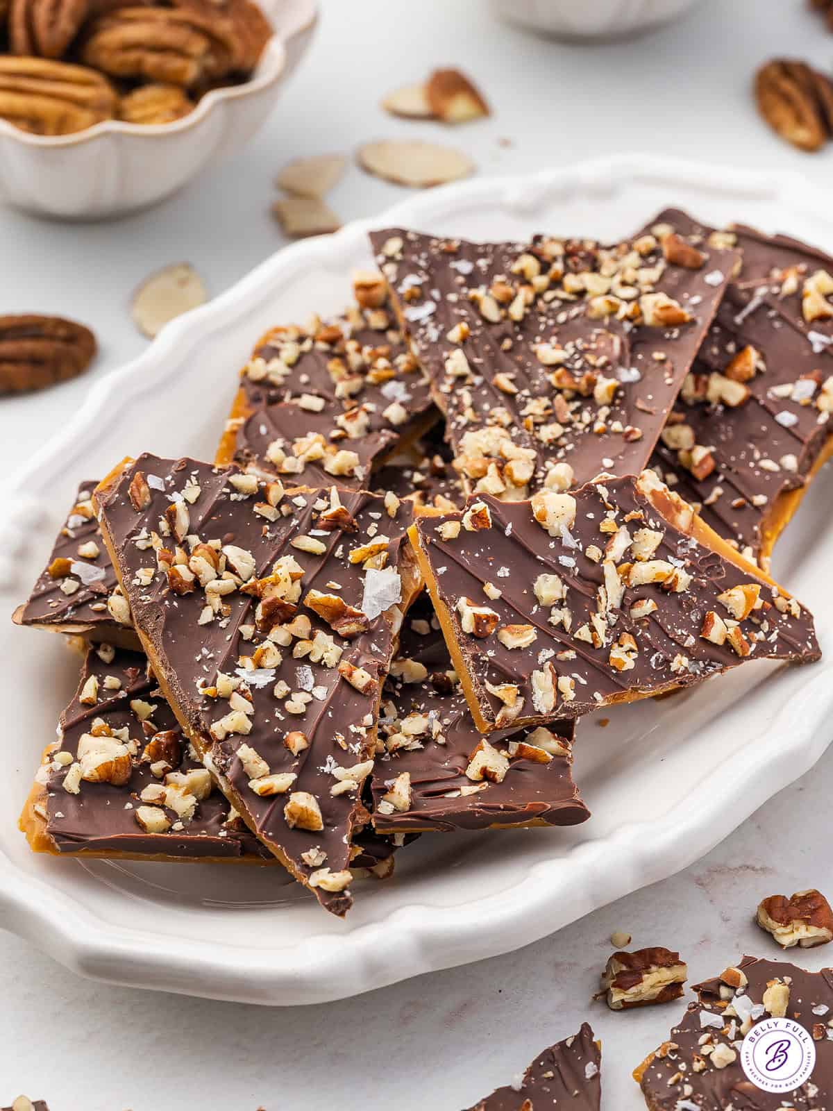 A platter with pieces of toffee bark
