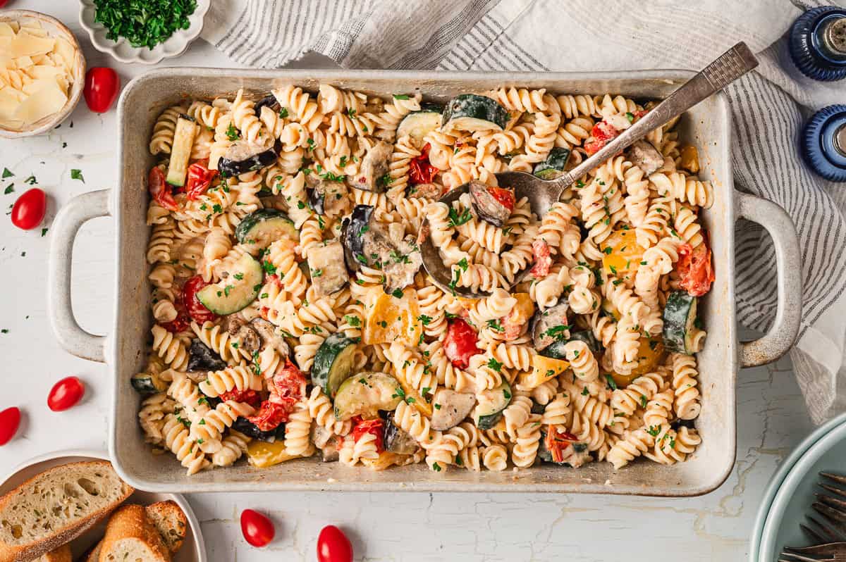 Overhead view of a baking sheet of ratatouille pasta
