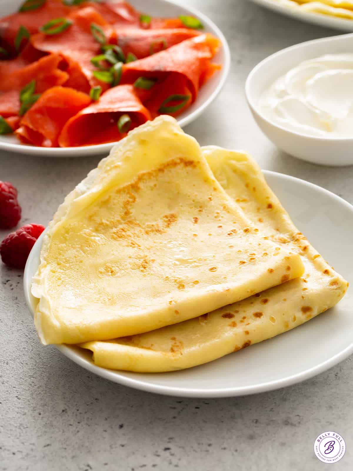 folded crepes on plate