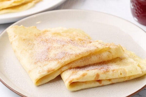 folded crepes sprinkled with cinammon-sugar