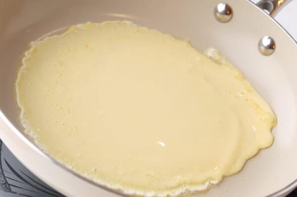 crepe batter in fry pan