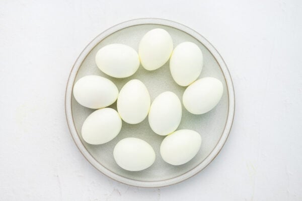 peeled hard boiled eggs on plate