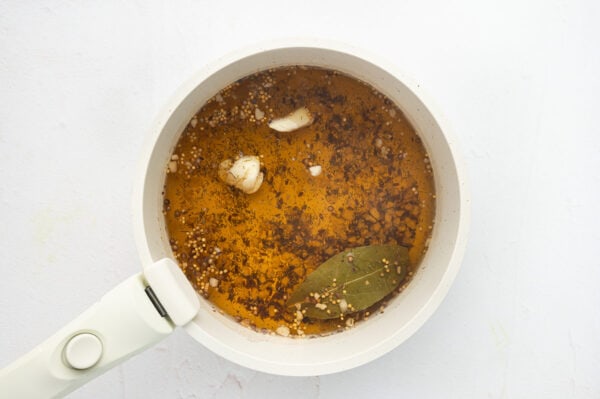 vinegar brine simmering in pot