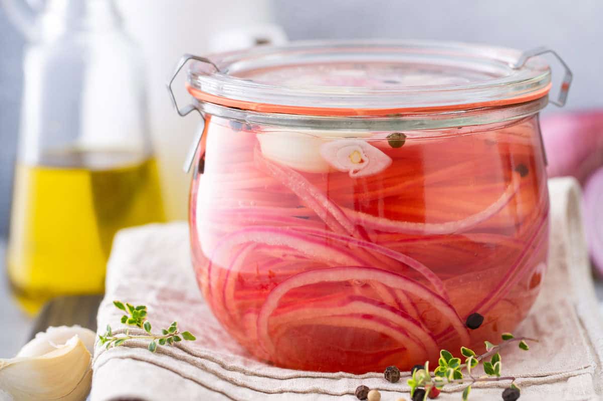 front view of Pickled Red Onions in glass jar