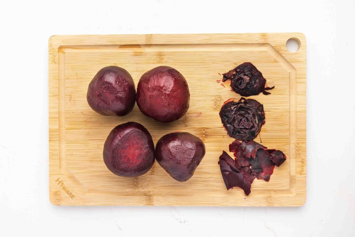 4 peeled roasted beets on cutting board