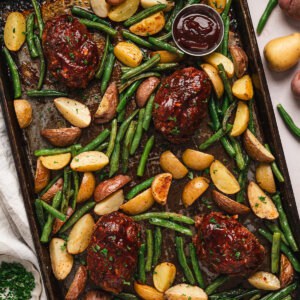 Overhead view of sheet pan mini meatloaves
