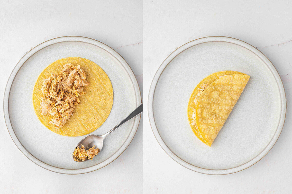 Cream cheese chicken mixture added to a corn tortilla